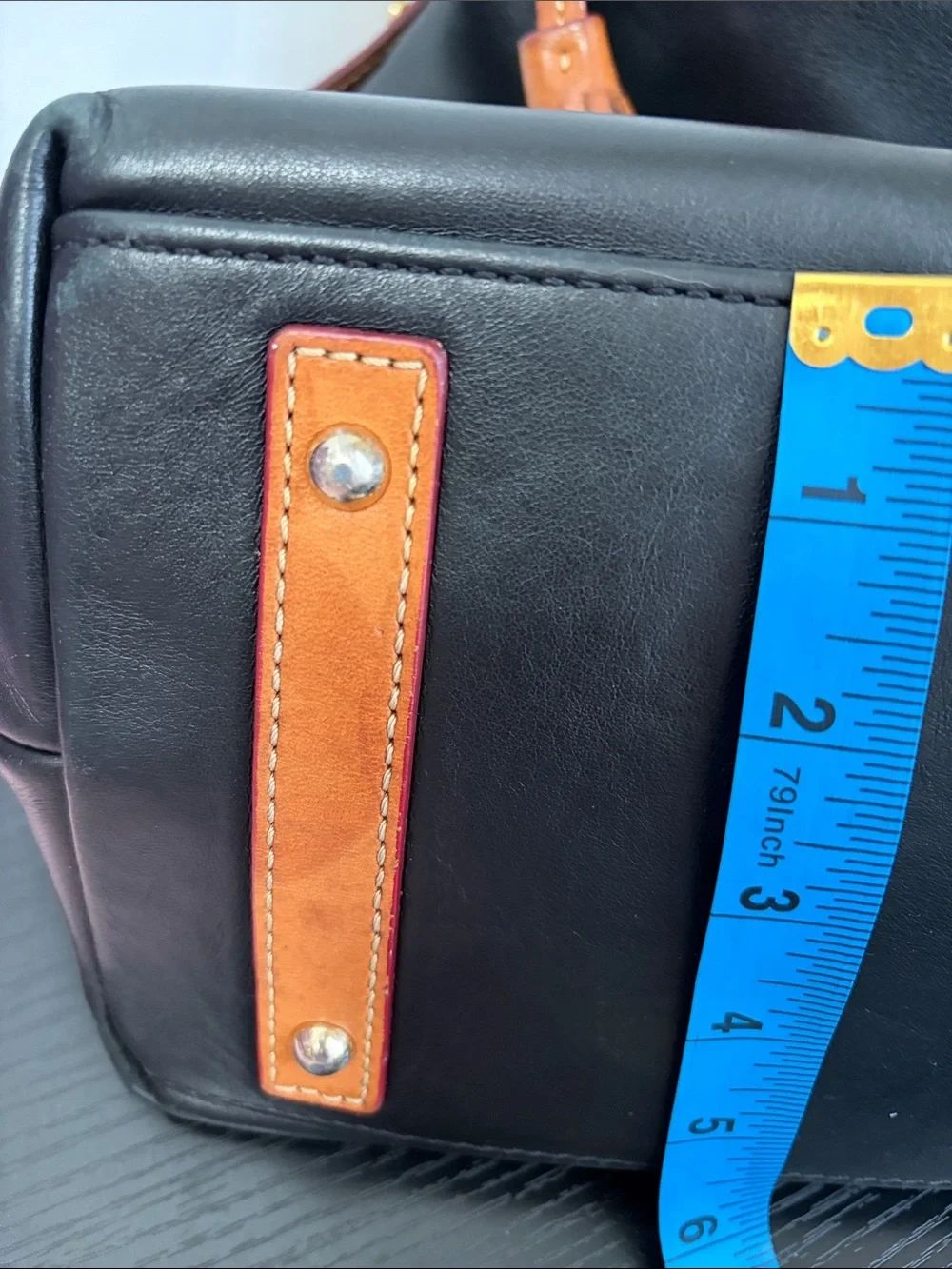 Dooney & Bourke needs screw